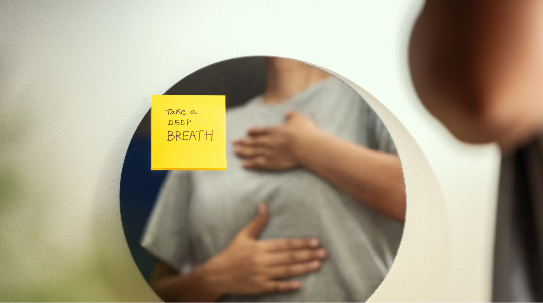 Yoga teacher guiding students in proper breathing for yoga practice